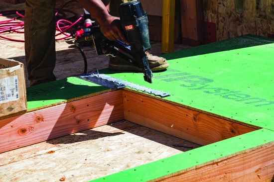 Whenever possible, strapping was nailed on before the walls were lifted.