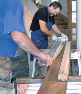 The author lines the bending mold with shrink-wrap to keep glue from sticking to the rail and bending mold.