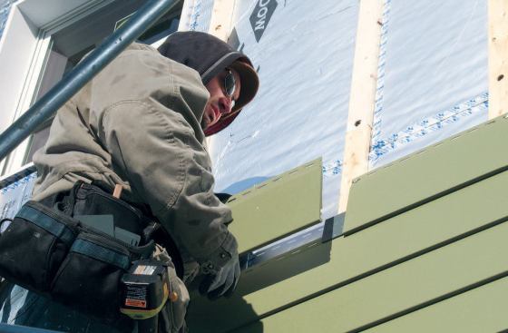 Affixing siding with backing