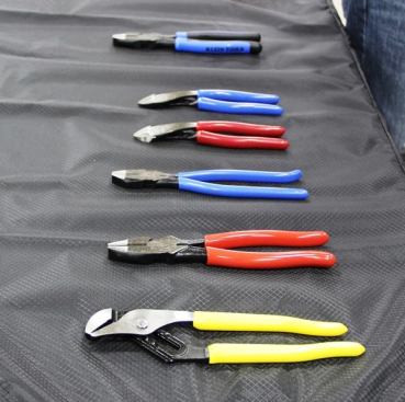 Different tools have different color handles—which makes it easy for tradesmen to know which tool they are grabbing out of their pouch.