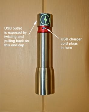 The receptacle for the USB charging cord normally remains hidden but can be exposed by twisting and pulling out on the end cap.