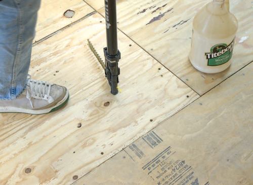 Using a stand-up screw gun with quick-loading 22-screw clips is substantially faster than shooting individual screws. It's also much easier on the knees.