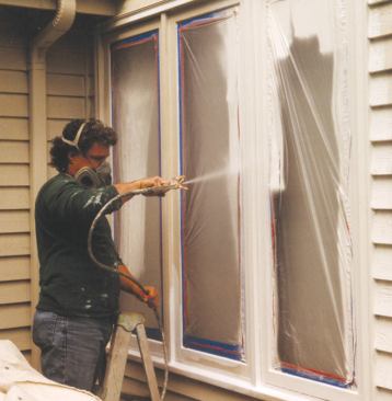 To minimize sag-producing crossing patterns, the author makes quick vertical passes with his spray gun and sprays lightly, sometimes applying two thinner coats rather than a heavier one that may need to be brushed out.