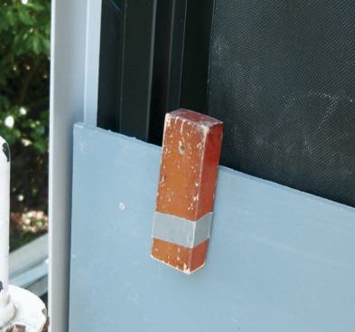 Wooden gauge blocks were used to maintain a consistent 1/4-inch spacing. Panel faces were prefinished, and all cut edges were painted before installation.