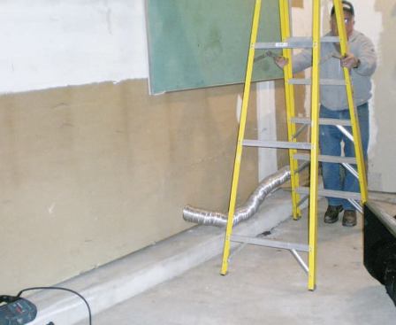At the back of the garage, the laundry-room wall was separating from the slab.