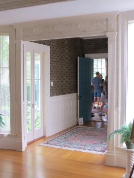 This dooway from the "Versailles" room has columns flanking both sides. Note the casing on the windows beside the doorway are a simple classical design with mitered corners.