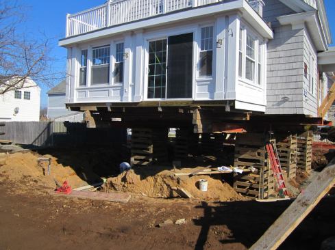 Cribbing and raising a typical Connecticut shore cottage costs about $30,000, reports architect Russ Campaigne, while constructing a new foundation and incidental costs can raise the total tab above $100,000.