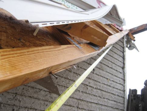 The roof sheathing was secured with nails every 48 inches and staples every 12 inches between the nails.