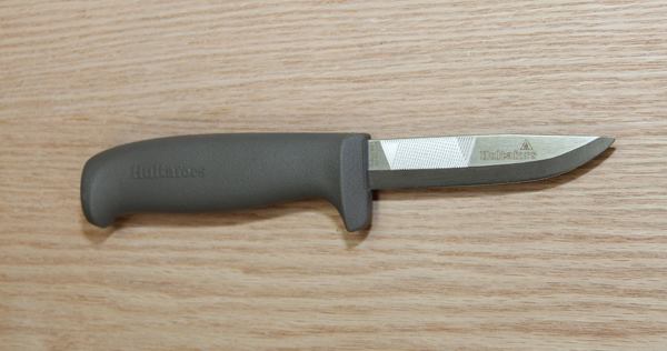 The Plumber’s Knife (VVS) is kind of interesting. The blade can be used for cutting and for scraping the burr off the inside of pipe as small as 1/2-inch in diameter. It’s hard to see in this photo, but the flat of the blade has been cross-hatched just out from the handle. This cross-hatched area functions as a file and can be used to deburr the outside of copper pipes.