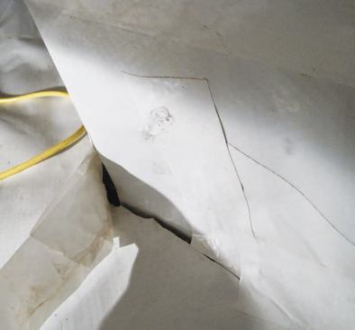 After removing any loose tape, the authors applied mesh tape and mastic to every lap and cut around the piers.