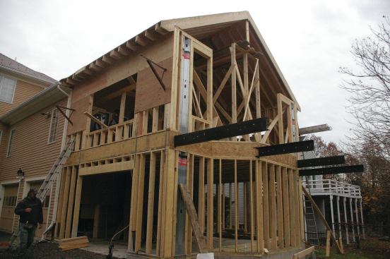 Structural steel can be used to frame wider balconies, though steel often requires specialized or unfamiliar techniques and can be more expensive than wood framing.