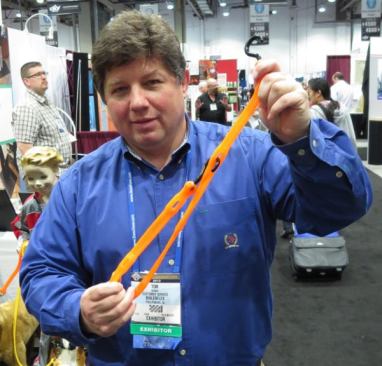 I didn’t say it’s perfect; that’s the name of the product line. The item shown here is the Adjust-a-Strap 6-in-1 Adjustable Bungee. It’s made by Bihlerflex, a New Jersey company that produces all sorts of polyurethane items. The 6-in-1 bungee clips into itself so you can shorten it or wrap it a number of different ways. According to the manufacturer the polyurethane material in this product won’t break down in the sun the way rubber and latex in other bungees will. The ends of this bungee are made from a stiff nylon material so they won’t rust or scratch your vehicle. The 6-in-1 model is 36” long and retails for $8 or $9.