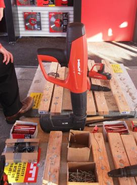 A powder-actuated fastening gun - really big, but not real.