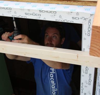 After driving all3 screws on the strike-side jamb, lag screws are driven through the window’s head rail.