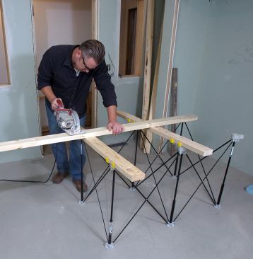 Centipede's K100 Sawhorse measures can accommodate a 2-by-4-foot benchtop, or users can lay out 2x4s for simple setup.