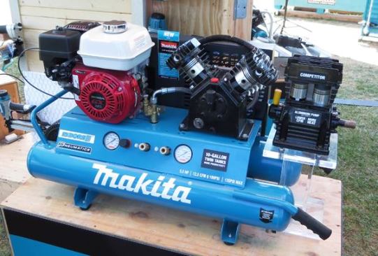 The Big Bore compressor is Makita’s first gasoline model (MAC5501G). Powered by a 5.5 HP 4-stroke Honda engine, this twin tank 10-gallon unit can produce 12.5 cfm at 100 psi. The pump on this one has been cut away to expose the twin-V cylinders and to show that the housing is cast iron, which is more durable than aluminium and better at dissipating heat. Features include a non-flat tire, ball valve drain, regulator, dual recessed gauges, and a braided stainless steel discharge hose. The MAC5501G is assembled in Florida and sells for around $900.