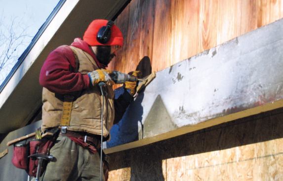 The panels were glued to the vertical cedar siding.