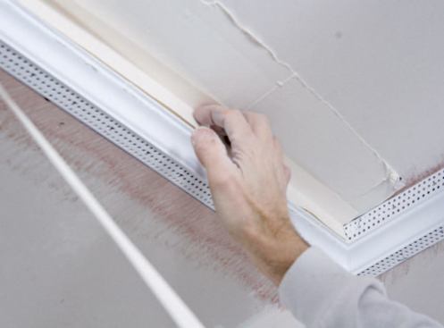 After the bead is installed, I give the tray a typical mud-and-tape three-coat drywall finish.