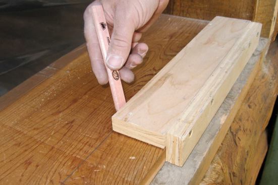 After removing the existing window, we compare its thickness with that of the new window and build a jig to mark the jamb for trimming