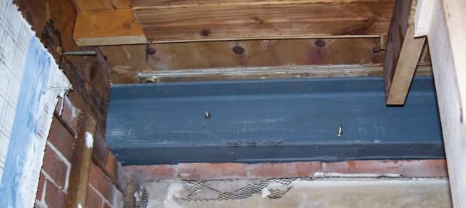 The longer channel was installed first and bolted into place.