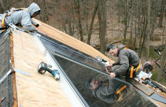 The Velux solar collectors were simply screwed directly to the roof sheathing.