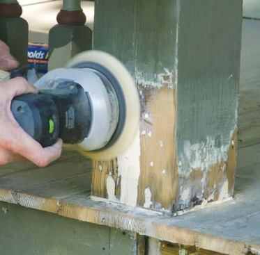 For paint-grade work, a random orbit sander loaded with 100-grit paper makes the patch disappear.