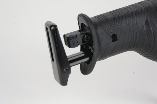 The Hitachi’s tiny spring-loaded lever pivots to release or lock the blade. It’s wise to lock the lever manually, a two-hands operation, rather than rely on the small spring to secure the blade. 