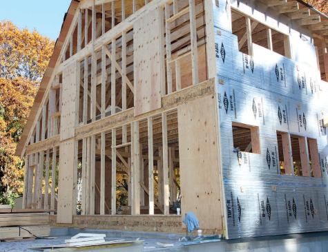 Intermittent vertical 4-by-10- foot sheets of 1/2-inch CDX plywood applied directly to the frame brace it against wind racking.