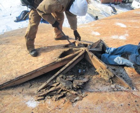 Warm, humid air had collected and condensed on the framing and sheathing of the bump-out entryway roof, causing it to rot.
