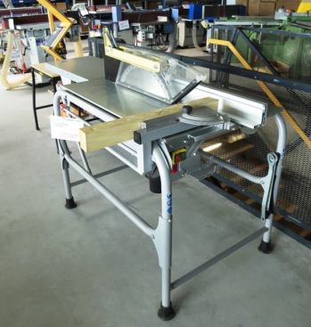 For truth in advertising, you’ve got to hand it to the Europeans—because their portable table saws do look like tables. I’m not making fun of this style of saw. With the use of dust collection little is gained by having the motor enclosed in a cabinet. And being so long front to back this saw has to be stable. The large blade, narrow rip capacity, and emphasis on cross cutting suggest this machine is intended for use with timber rather than sheet goods.