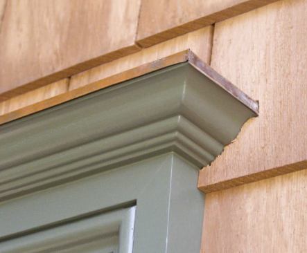 To help prevent leaks, shingles should be notched around corners and scribed to fit tightly against the trim.
