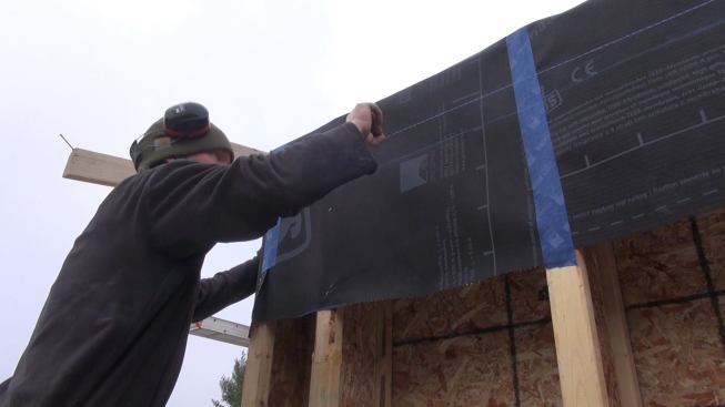 Snapping a line for the soffit ledger.