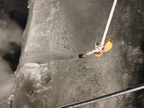 A wood block attached to the base of the steamer wand prevents damage to asphalt shingles.