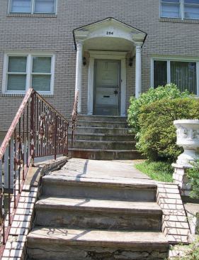 Located in the historic Forest Hill section of Newark, N.J., the house was suffering from a classic case of deferred maintenance, and the owner had received a summons from the city requiring repairs to the existing façade, steps, and front walkway.