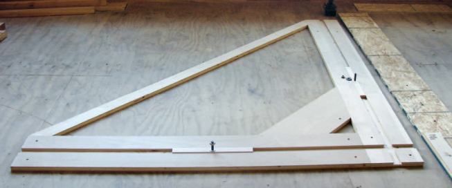 I made my trammel from 3/4-inch birch plywood scraps, some rock maple, and two 3/8-inch plow bolts with nuts and washers.