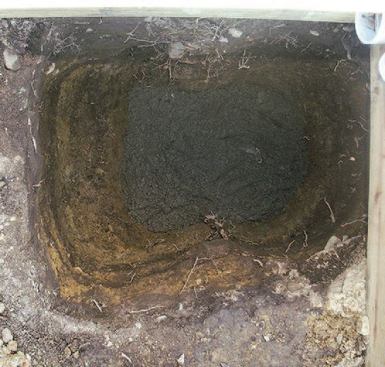 This provides a good base for the footing, which consists of 6 inches of concrete to tie all the rock together and an additional 6 inches for anchoring the tube form.