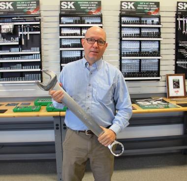 A Big Tool—the wrench, not the guy in the photo. This oversize wrench bears the SK label but was likely produced by sister-company Western Forge, at its plant in Colorado. Wrenches and sockets this size and larger are typically used in the oils and gas industry at wells, pipelines, refineries, and the like.