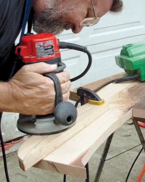 Pattern-Rout the Edge: Removing the excess beneath the original 1/8-inch channel.