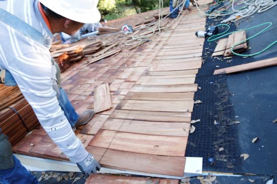 The roofers install the wood shingles pretty easily over the Cedar Breather.