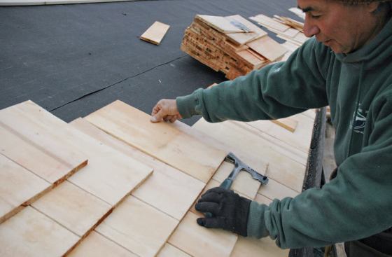 The hatchet is much faster than wood strips for lining up courses.