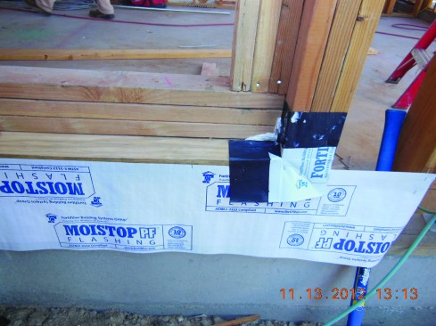 Flashing a shallow recess. At the bottom of the window, first caulk the framing, then apply pre-fit corners to the outside edge of the recessed opening.
