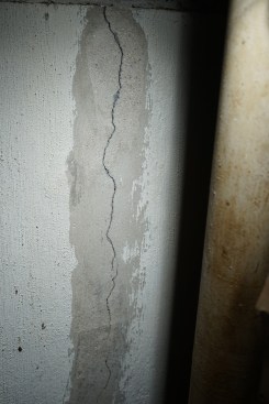 With the foundation wall surface free of paint and dirt ...