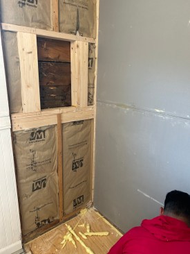 An out-of-plumb wall also needed to be reframed. 