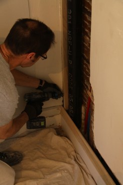 I began by ripping a piece of 2-by and installing it even with the plane of the pipe.