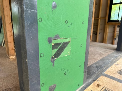 The author corrected this by removing the box and patching in the sheathing ...