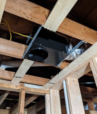 It’s usually easier to secure the duct to the fan first and then install the fan in the ceiling. 
