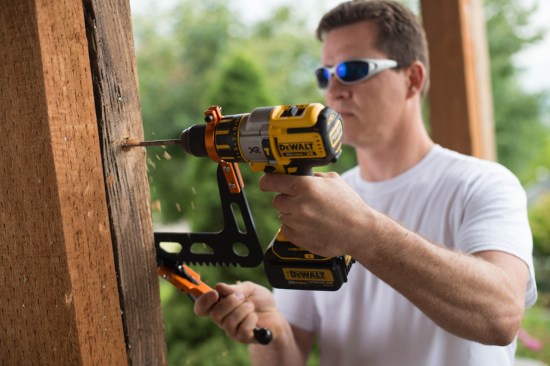 The tool secures your drill in its armature, then C-Clamps itself to the work.