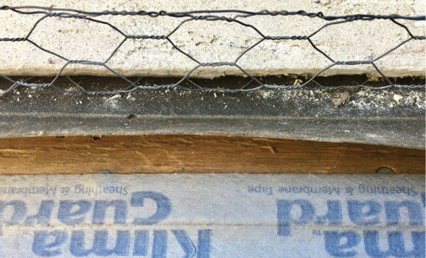 If the plywood is flush or overhangs the concrete, apply tape over the joint. This will stop any air from moving under the bottom plate, which constitutes the lion’s share of stucco leaks.