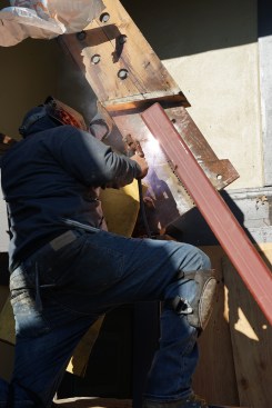 Jorge Garcia welded the columns to the flitch steel at the end of a rafter. 