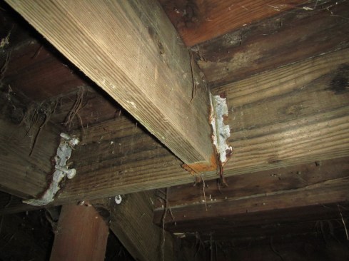 Located a few miles inland from the coast in California, this deck was built in 2006 using lumber treated with copper azole (CA) to retention levels for above-ground use (UC3B). Note the severe corrosion of the 10-year-old joist hangers.